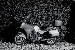 A portrait of a BMW K100 RT taken at midnight
